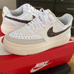 Nike Court Vision Alta Sneakers white with leopard spotted logo.